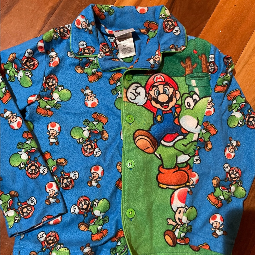 Super Mario pajama. Size 6/7 .Pet/smoke free.